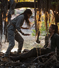 Iyana Halley and Sharlto Copley costar in Beast