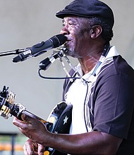 A celebration of African and African-American folklife headlined the 31st Down Home Family Reunion on Saturday, Aug. 20, in Jackson Ward’s Abner Clay Park. The event, sponsored by the Elegba Folklore Society, featured interactive demonstrations, a Heritage Market with African imports and music from musicians and performers that included, Terry “Harmonica” Bean, in the photo, the Pan Masters Steel Orchestra and Trouble Funk.