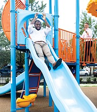 Later, Mr. Stoney and Superintendent Jason Kamras took a ride on the playground’s sliding equipment.