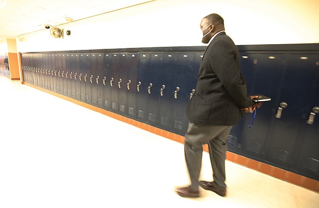 Riddick T. Parker Jr., the late principal of George Wythe High School, walked the empty halls after school on Tuesday, Feb. 1, 2022. He died last Friday, Aug. 19, while riding his bicycle in Chesterfield County. Mr. Riddick was a 2002 Super Bowl champion with the New England Patriots.