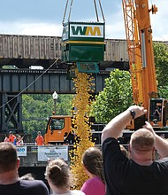 Some 15,000 ducks were dropped in the canal during the event, hosted for the first time in more than 10 years by the Autism Society of Virginia. This year’s fundraiser featured the Festival of Inclusion, and welcomed people with autism and other developmental challenges.