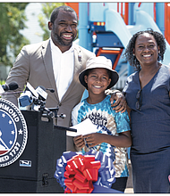 Skylar Hayden, who will be in third grade this fall at Henry L. Marsh III Elementary School this year, is shown with Mayor Levar M. Stoney and Marsh Elementary Principal Kimberly Cook during the Aug. 18 unveiling of the school’s new playground. Skylar said the mayor “works hard to make sure students like me have the tools we need to be successful. We have a new school and now a new playground. Thank you, Mayor Stoney.”