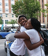 Last weekend, new and returning students and their families filled the streets at Virginia Commonwealth University’s Monroe Park Campus for the annual move-in weekend. What did the students have in tow? “Mini fridges, TVs, boxes of snacks, piles of clothes and all manner of creature comforts they’ll want and need for the new academic year,” according to VCU’s news website. Hillary Amaniampong of Dumfries and her mom bid a brave farewell to one another as Ms. Amaniampong, a nursing major, moves into a VCU dormitory on Franklin Street on Aug. 20.