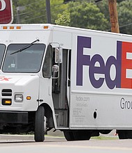 People hoping to get their holiday shopping delivered on time could be caught in the middle of a growing battle between FedEx and thousands of contractors who deliver most FedEx packages.
Mandatory Credit:	Rogelio V. Solis/AP