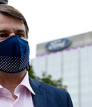Ford is cutting 3,000 white collar jobs as it prepares to shift from traditional internal combustion engine vehicles to electric vehicles. CEO Jim Farley is pictured here in Dearborn, Michigan, in May of 2021.
Mandatory Credit:	Jeff Kowalsky/AFP/Getty Images