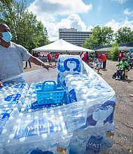 Residents of rain-battered Jackson, Mississippi, are now contending with little or no water pressure in their homes after the city's main water treatment facility failed August 29, leaving them without enough water to flush toilets or fight fires.
Mandatory Credit: Barbara Gauntt/Clarion Ledger/USA Today Network