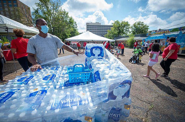 Residents of rain-battered Jackson, Mississippi, are now contending with little or no water pressure in their homes after the city's main water treatment facility failed August 29, leaving them without enough water to flush toilets or fight fires.
Mandatory Credit:	Barbara Gauntt/Clarion Ledger/USA Today Network