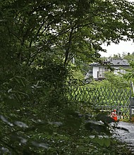 A barricade bars entry to a designated area in the Fukushima prefecture town of Futaba, northeastern Japan, on August 30.
Mandatory Credit: Kyodo News/Getty Images