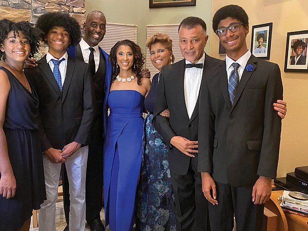Dr. Tinina Cade (third from right) is shown with members of her family from left, Simone Hammond, Kai Hammond, Dr. Jason Hammond, Dr. Camille Hammond, Dr. Ronald Cade, and Aaron Hammond.
