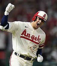 Shohei Ohtani made American League/National League history on August 31.
Mandatory Credit:	Ashley Landis/AP