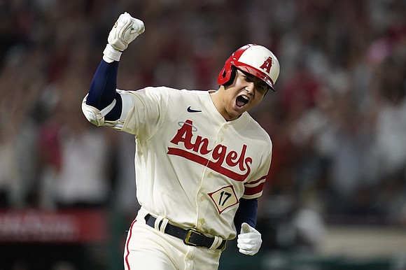 Shohei Ohtani became the first player in American League/National League history to hit 30 home runs and record 10 pitching …