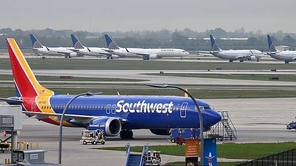 The pilot of a Southwest Airlines flight threatened to cancel takeoff after someone on the plane sent a naked photograph …