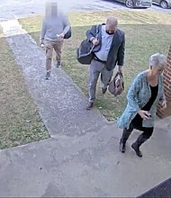 Newly obtained surveillance video shows a fake Trump elector escorting operatives into a Coffee County, Georgia, elections office before a voting machine breach.
Mandatory Credit:	Coffee County, Georgia