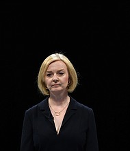 Foreign Secretary Liz Truss speaks on stage in Birmingham, England, on August 23.
Mandatory Credit:	Anthony Devlin/Getty Images