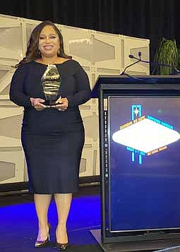Public relations executive, Kayla Tucker Adams, receiving the 2022 Patricia L. Tobin Media Professional Award at the National Association of Black Journalists (NABJ) Hall of Fame Luncheon in Las Vegas. PRNewsFoto.