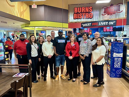 Burn’s Original BBQ family with Kroger executives and staff