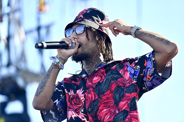 PnB Rock, performing here in 2019, talked about fellow artists feeling targeted for robbery days before he was gunned down in Los Angeles.
Mandatory Credit:	Scott Dudelson/Getty Images/File