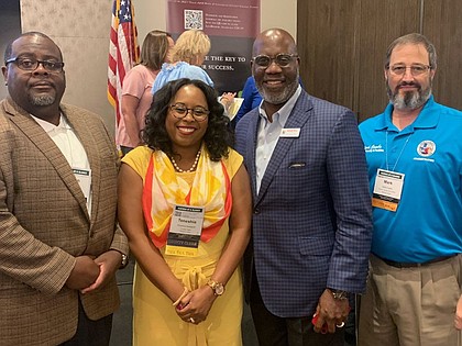 Administrator of Records Adrian Davis, Clerk Teneshia Hudspeth, Chief Deputy Michael Winn and Director of Security Mark Combs at the CDCAT Fall Conference in College Station