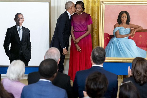 Former President Obama and his wife, former First Lady Michelle Obama, are shown at the unveiling of their official White House portraits during a ceremony Sept. 7 in the East Room of the White House.