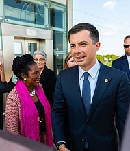 U.S. Rep. Sheila Jackson Lee and Secretary of Transportation Pete Buttigieg arrive at Burnett Transit Center.