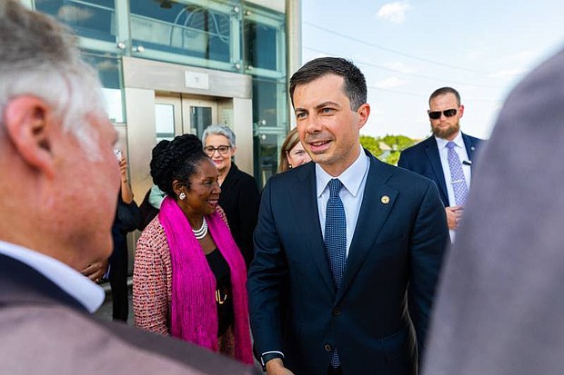 U.S. Rep. Sheila Jackson Lee and Secretary of Transportation Pete Buttigieg arrive at Burnett Transit Center.