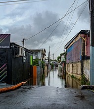 More than 1 million were left without running water after Hurricane Fiona ripped through the Dominican Republic. A man is pictured here looking at a flooded street in the Juana Matos neighborhood of Catano, Puerto Rico, after Hurricane Fiona passed through.
Mandatory Credit:	-/AFP/Getty Images