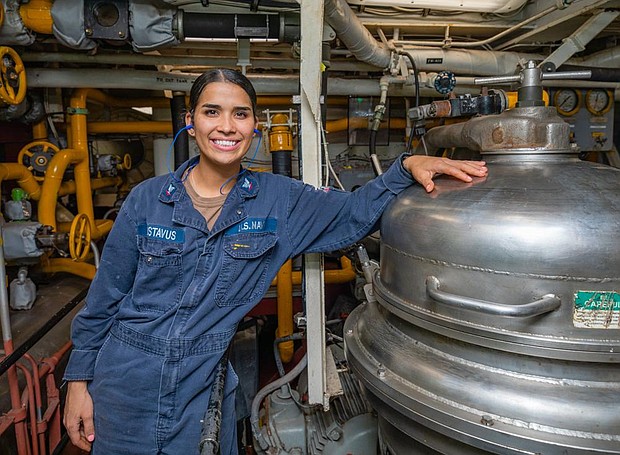 220810-N-NY362-2006 PHILIPPINE SEA (Sept 10, 2022) Gas Turbines Systems Technician (Mechanical) 3rd Class Sierra Gustavus, from Baytown, Texas, poses for a photograph next to a fuel oil lamp aboard Ticonderoga guided-missile cruiser USS Antietam (CG 54). The Antietam fuel team obtains, inspects, and delivers F76 fuel samples for the ship. (U.S. Navy Photo by Mass Communication Specialist 3rd Class Santiago Navarro)