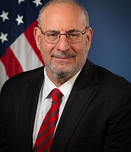 US Attorney Andrew M. Luger for the District of Minnesota.