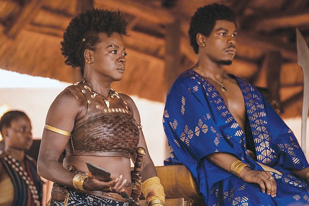 General Nanisca (Viola Davis) leads a military regiment that serves at the pleasure of young King Ghezo (John Boyega) in “The Woman King."