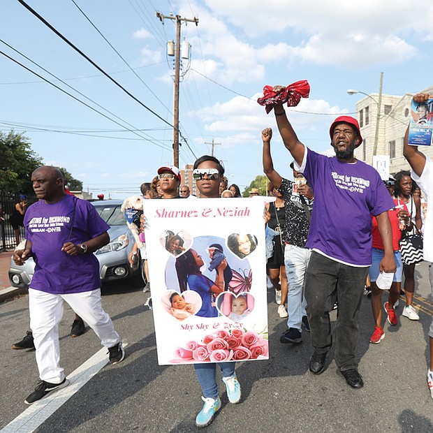 On Sept. 12, Tynashia ‘Nae’ Humphrey, 15, was walking to the store in her Gilpin Court neighborhood when she was killed by a bullet not intended for her. In response to her killing last week, a march and rally were organized from the parking lot of Mt. Moriah Baptist Church to the steps of the John Marshall Courts Building on Sunday, Sept. 18. Participants included Ms. Humphrey’s family members, friends and others who mourn her death.