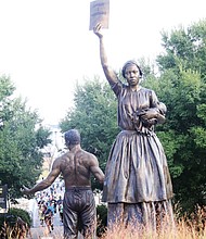 As runners in the inaugural RUN RICHMOND 16.19 approached Brown’s Island Sept. 17, the Emancipation and Freedom Monument awaited them. The monument features two 12-foot bronze figures – a male, and a female holding an infant – who represent those newly freed from slavery. Designed by artist and sculptor, Thomas Jay Warren, of Oregon, the brick plaza and landscaping was designed by architect Drew Harrigan of Four Winds Design and constructed by Fred Williams and his team at Williams Construction. Here is how Venture Richmond describes the monument: "On a rainy September 22, 2021, following nearly 10 years of planning and fundraising, Virginia’s Dr. Martin Luther King, Jr. Memorial Commission dedicated and unveiled Richmond’s newest monument — the Emancipation and Freedom Monument — on Brown’s Island, along Downtown Richmond’s riverfront. The new monument commemorates the efforts of both enslaved and free African- Americans whose ancestors endured tragedies and triumphs in their struggle to gain their freedom through emancipation.”