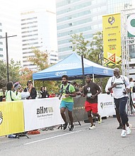 Runners take off during the inaugural RUN RICHMOND 16.19 that started and ended at Kanawha Plaza in Downtown Richmond on Saturday, Sept. 17. The run was organized by actor and model Djimon Hounsou’s foundation in collaboration with The Black History Museum & Cultural Center of Virginia and Sports Backers. The run shines a light on the achievements of the Black community over the past 400 plus years with the designated courses of 16.19 km and 6.19 miles. As the runners proceed on the course they pass various historical Black sites throughout the city.