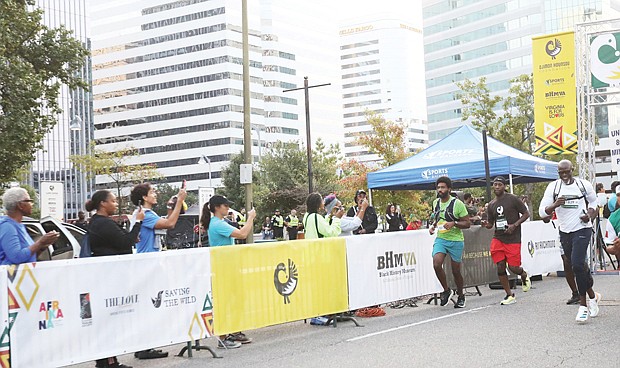 Runners take off during the inaugural RUN RICHMOND 16.19 that started and ended at Kanawha Plaza in Downtown Richmond on Saturday, Sept. 17. The run was organized by actor and model Djimon Hounsou’s foundation in collaboration with The Black History Museum & Cultural Center of Virginia and Sports Backers. The run shines a light on the achievements of the Black community over the past 400 plus years with the designated courses of 16.19 km and 6.19 miles. As the runners proceed on the course they pass various historical Black sites throughout the city.