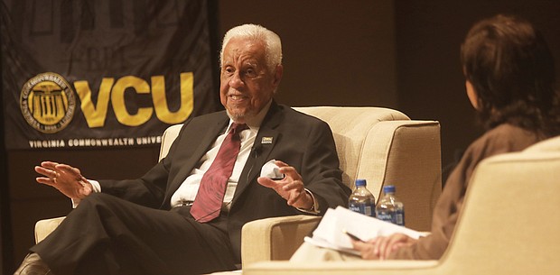 L. Douglas Wilder, left, and Susan Gooden, dean of the Wilder School at Virginia Commonwealth University, share the stage Monday for the 2022 Wilder Symposium discussion and Q&A at the Singleton Center for the Performing Arts on VCU’s campus.
