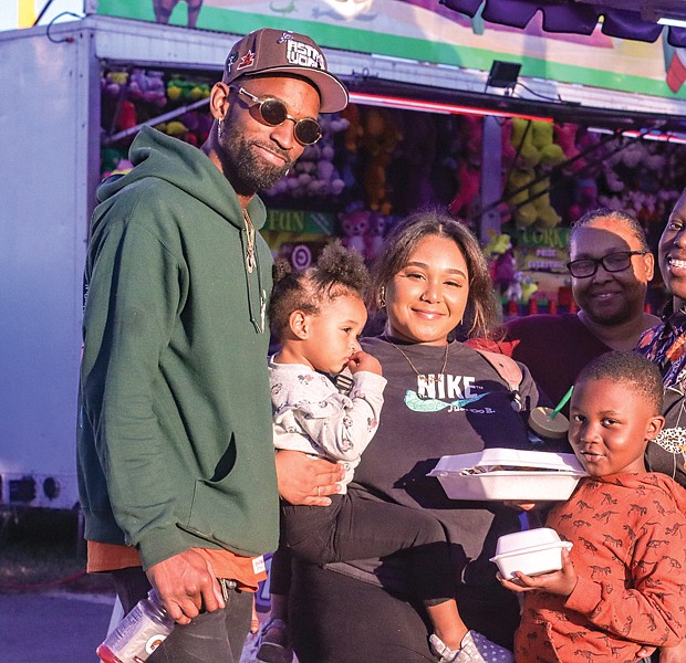 Anicia King and family, also from Newport News, grabbed early dinner from one of the fair’s food vendors. Animal competitions, creative art exhibits and culinary contests are among several events that will continue at the fair until it ends Oct. 2.
