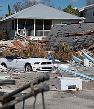 After Hurricane Ian obliterated communities in Florida, rescue crews going door-to-door in search of survivors are reporting more deaths.  A damaged home is pictured here in the wake of Hurricane Ian in Fort Myers Beach, Florida.
Mandatory Credit:	Joe Raedle/Getty Images