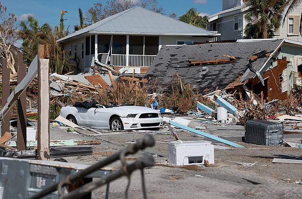 After Hurricane Ian obliterated communities in Florida, rescue crews going door-to-door in search of survivors are reporting more deaths.  A damaged home is pictured here in the wake of Hurricane Ian in Fort Myers Beach, Florida.
Mandatory Credit:	Joe Raedle/Getty Images
