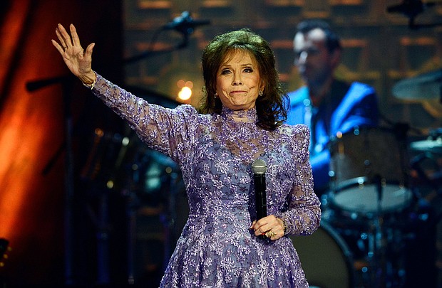 Dolly Parton, Martina McBride, and other celebrities react to death of country singer Loretta Lynn, seen here in September 2014, in Nashville, Tennessee.
Mandatory Credit:	Mark Zaleski/AP