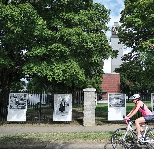 A look back at the summer of 2022 includes a cyclist riding past Black Lives Matter photographs at Virginia Union University, 1500 N. Lombardy St.