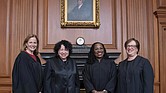 In this image provided by the Supreme Court, from left, Associate Justice Amy Coney Barrett, Associate Justice Sonia Sotomayor, Associate Justice Ketanji Brown Jackson, and Associate Justice Elena Kagan stand in the Justices’ Conference Room on Sept. 30 prior to the formal investiture ceremony for Justice Jackson at the Supreme Court in Washington.