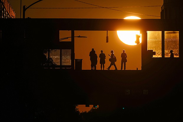 US economy will soon start losing 175,000 jobs a month, Bank of America warns. In this image, commuters are pictured at Addison Station in Chicago on September 19.
Mandatory Credit:	Kiichiro Sato/AP