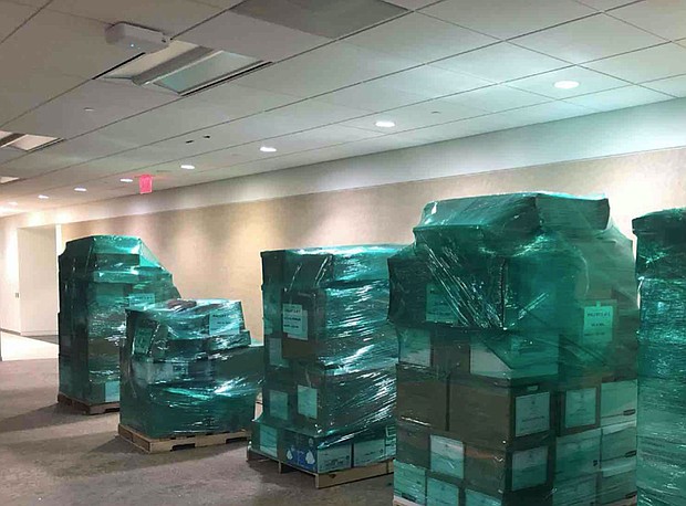 Pallets of boxed items stacked in a Crystal City, Virginia's office waiting to be moved to Florida for former President Donald Trump.
Mandatory Credit:	General Services Administration