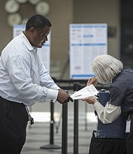 Election officials boost security as midterms draw closer. A voter in Denver here turns in his ballot for the Colorado primary elections on June 28.
Mandatory Credit:	Marc Piscotty/Getty Images