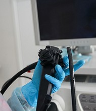 A new study questions the effectiveness of colonoscopies for cancer screening. Pictured is an endoscopist with an endoscope in his hands.
Mandatory Credit:	Adobe Stock