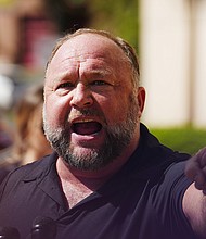 A jury has reached a decision on how much talk show host Alex Jones should pay eight families of Sandy Hook Elementary School shooting victims and one first responder. Jones is seen here on September 21 in Waterbury, Connecticut.
Mandatory Credit:	Joe Buglewicz/Getty Images