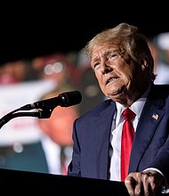 A judge on Wednesday denied former President Donald Trump's request to pause his deposition in the E. Jean Carroll defamation lawsuit. Trump here speaks at a rally in Minden, Nevada, on October 8.
Mandatory Credit:	Carlos Barria/Reuters