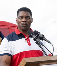 (L-R) Rick Scott, Herschel Walker New poll finds Georgia Senate race remains unchanged after allegations about Herschel Walker, here speaking during a campaign stop on October, 11, Carrollton, Georgia.
Mandatory Credit:	Megan Varner/AP