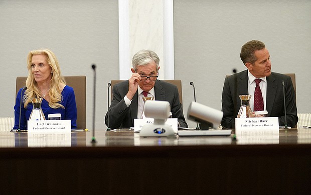 Flanked by Vice Chairs of the Board of Governors of the Federal Reserve Lael Brainard and Michael Barr, Chairman Jerome Powell delivers opening remarks during an event in Washington, D.C. on September 23.
Mandatory Credit: Kevin Lamarque/Reuters