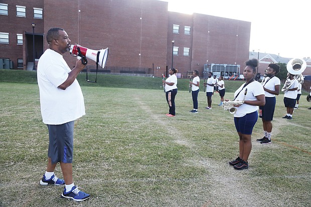 Members of Virginia State University’s Marching Band practice music and high-stepping routines before the school’s recent homecoming game. Taylor Whitehead is the interim band director for Virginia State University’s 120- member marching band, known as the “Trojan Explosion.”