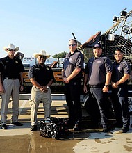 Representing the Fort Bend County Sheriff’s Office and Northeast Fire Department Regional Dive Team are (l to r) Patrol Lt. Josh Dale, Patrol Major James Burger,
Asst. Chief Manuel Zamora, Sheriff Eric Fagan, Fire Chief Travis Baxter, Asst. Fire Chief Robert Gomez, Capt. Donney Guebara, and firefighters Christian Bruner and Robert Valdez.